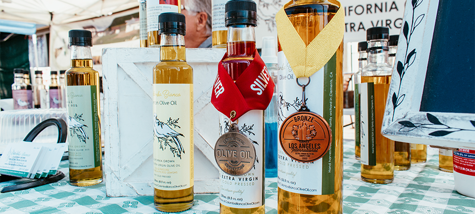 Picture of olive oil with medals and awards