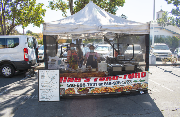 Owners of Ching's Toro Toro in their stall