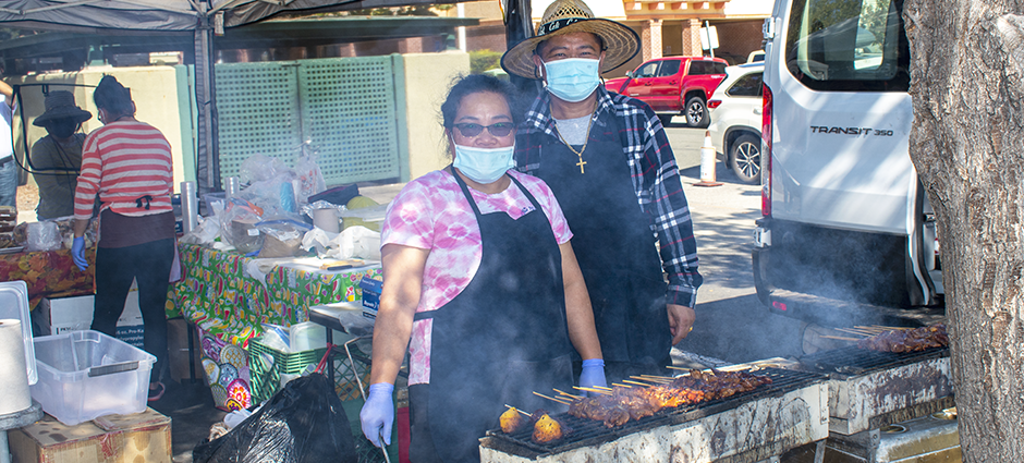 Owner of Ching's Toro Toro behind the grill