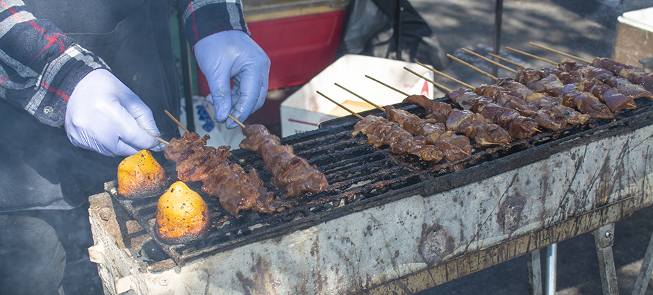 Chicken on the grill at Ching's Toro Toro stall