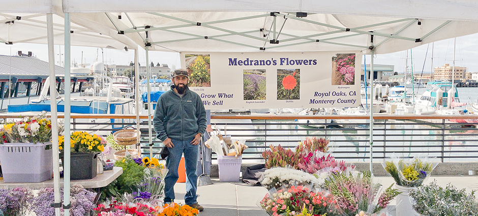Medrano Flower vendor at the market