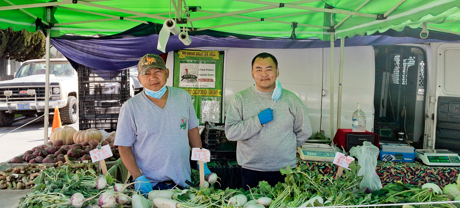 Mova's Farm workers at stall