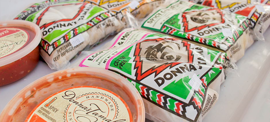 Products at the Donna's Tamales booth, tamales and salsa