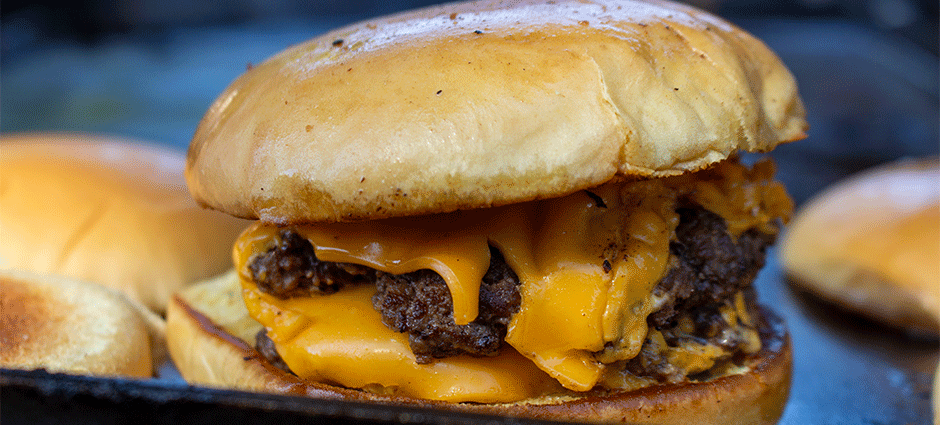 A grilled cheese double smash burger inside the Ace of Flavors tent at the Concord Thursday Farmers' Market